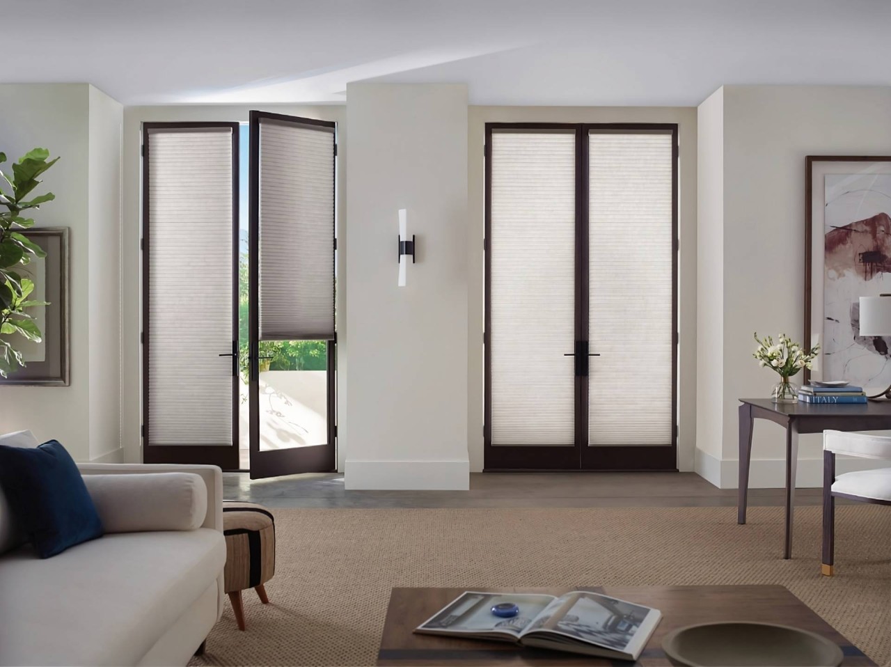 Hunter Douglas Duette® Cellular Shades on French doors leading outside from a modern living room at Walls & Windows near Bellingham, WA