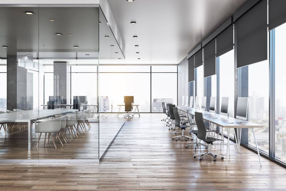 A luxurious office building with chic and minimalistic roller shades as commercial window treatments near bellingham, wa